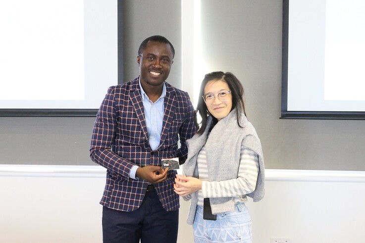 As a token of thanks, Dr. Caroline Law, Teaching Fellow of Department of Environment, Faculty of Design and Environment presented a gift to Dr. Tobi Eniolu Morakinyo for this seminar event.
